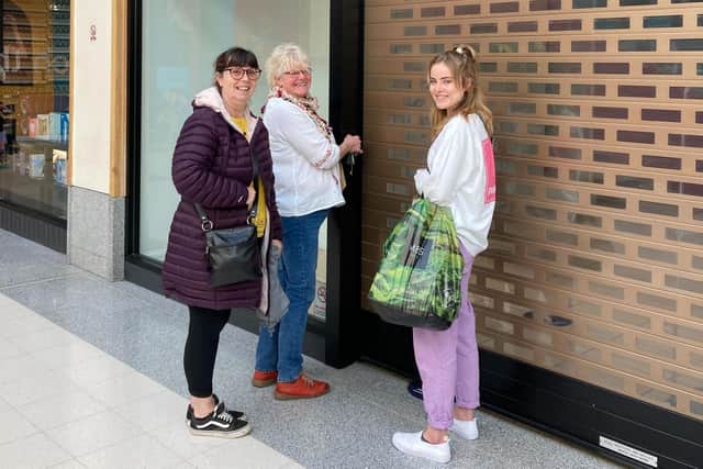 The Rainbow Centre's Trish Kinsella (centre) with volunteers at the new donation hub. (Photo: Brunswick)