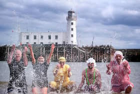 YMCA members went for a dip in South Bay to raise funds for the theatre.