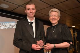 Jacob James collects his award from vice-principal Helen Wooldridge.