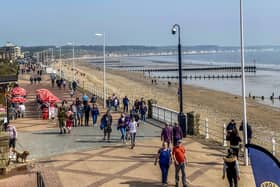 Visitors enjoy a walk along Bridlington’s North Promenade. Photo courtesy of TCF Photography.
