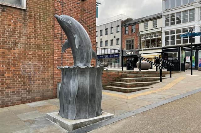 The new dolphin sculpture and recycling bin on Vernon Road.