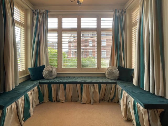 A lovely large box bay window with seating provides extra light, space and character.