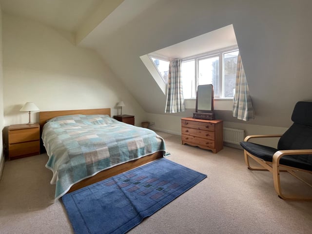 A double bedroom has plenty of space within the property.