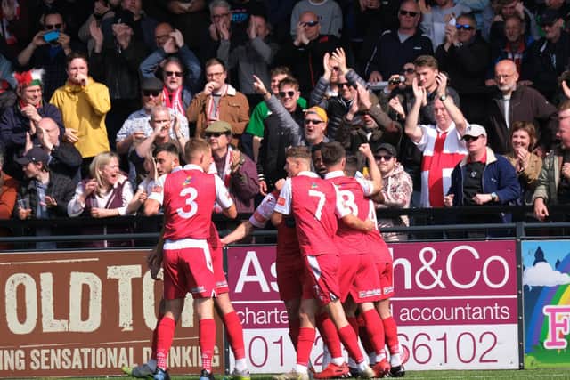 Boro fans and players congratulate Michael Coulson on his first goal