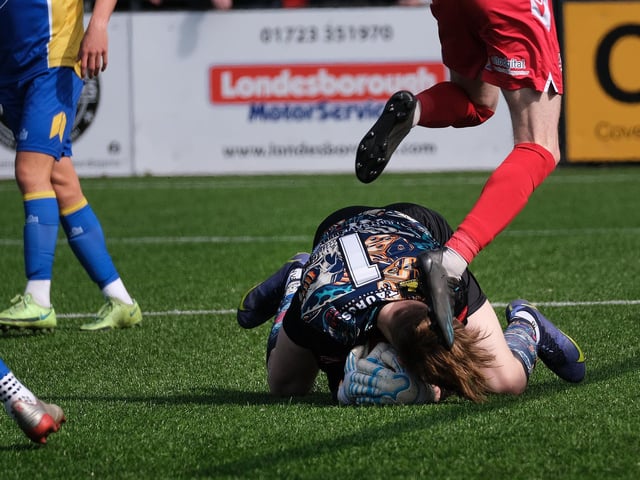 Jack McIntyre gathers the ball safely for Radcliffe against Boro