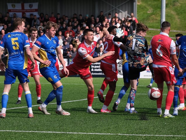 A goalmouth scramble