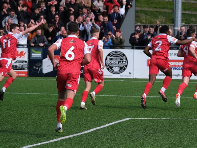 Michael Coulson, right, celebrates his goal for Boro