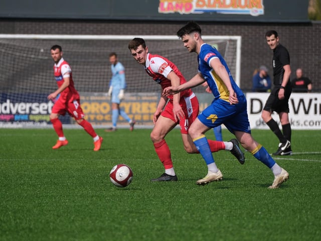 Luca Colville tracks a visiting player