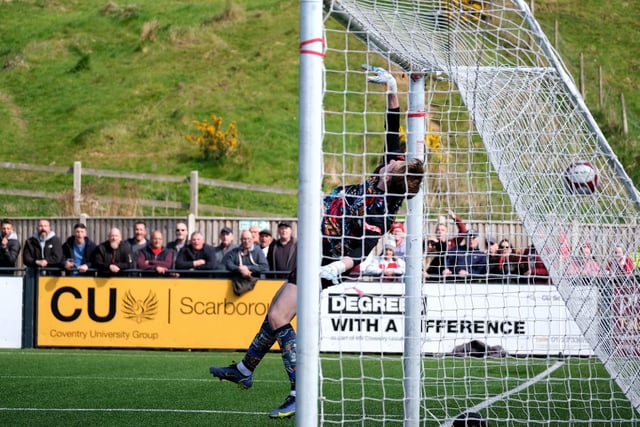 Michael Coulson's second goal, an acrobatic effort, beats the Radcliffe keeper