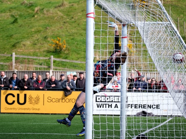Michael Coulson's second goal, an acrobatic effort, beats the Radcliffe keeper