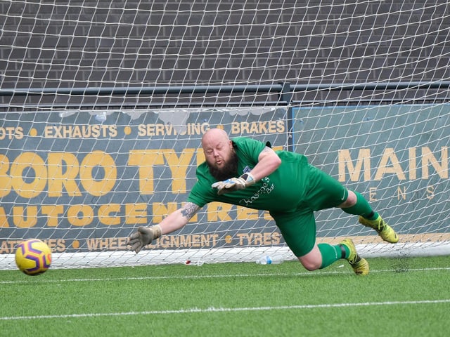 Roscoes Bar keeper Nat Harrison is beaten by a Cayton penalty
