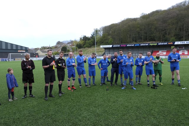The Roscoes Bar players and referees applaud Cayton