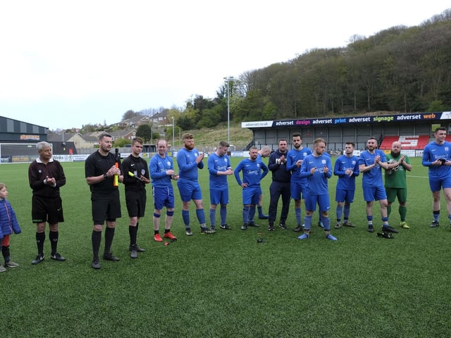 The Roscoes Bar players and referees applaud Cayton