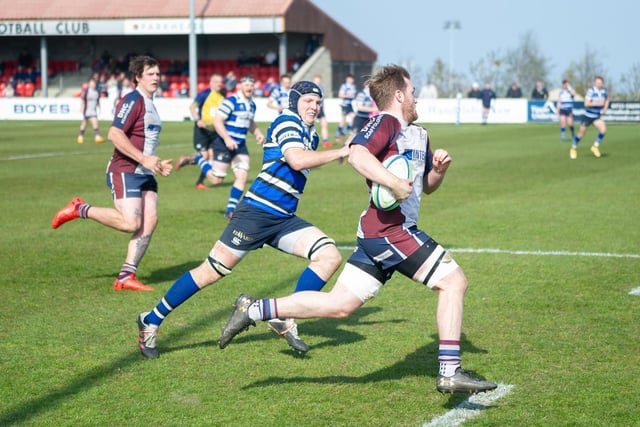 Drew Govier on his way to scoring a try for Scarborough RUFC v Driffield