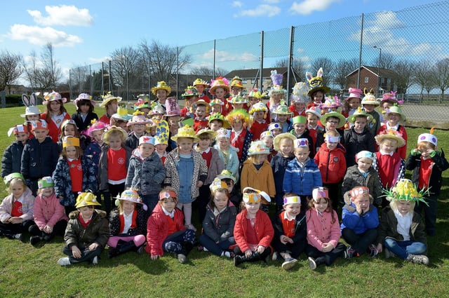 This excellent photograph, taken by Paul Atkinson, features an Easter Bonnet parade and best dressed winners at New Pasture Lane Primary School. Do you recognise any of the youngsters in the picture? (pa1513-23a)