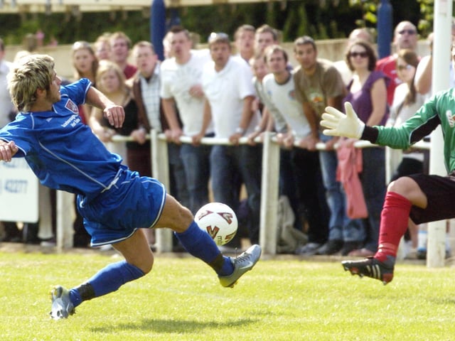 Do you know the player who scored Scarborough Athletic's first-ever goal in a competitive fixture?