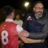 Scarborough boss Jonathan Greening and midfielder Ryan Watson celebrate the play-off semi-final win against Matlock on Tuesday night