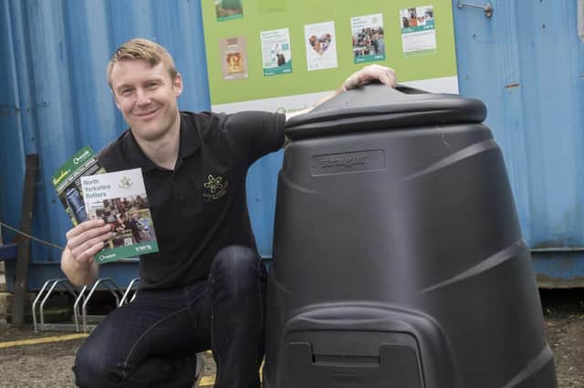 North Yorkshire County Council volunteer co-ordinator Jeff Coates with a compost bin.