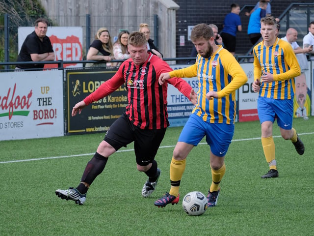A midfield battle in the League Trophy final