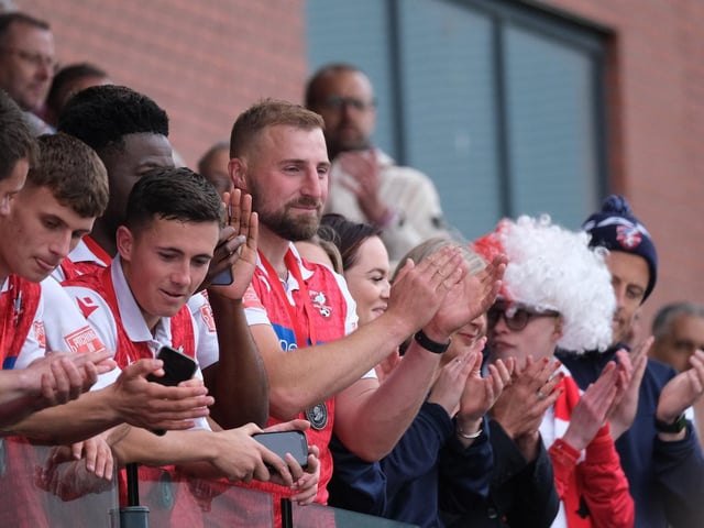 Boro's players join in the post-match applause
