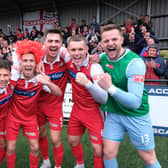 GOING UP: Scarborough players celebrate their promotion to National League North after a play-off victory over Warrington Town. Picture: Richard Ponter