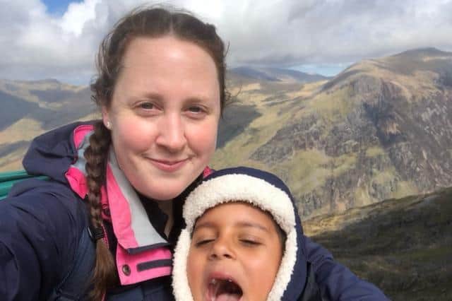 Carolyn and her son William are walking up 100 mountains to raise money for Cancer Research, in memory of a family friend.