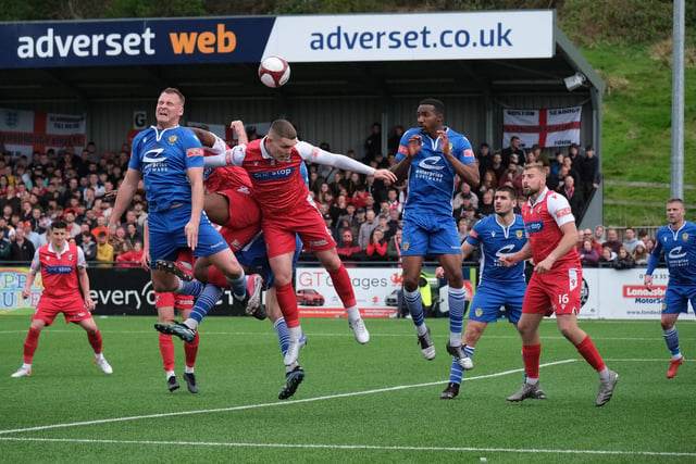 Defender Bailey Gooda, who scored the winning goal for Boro, wins a header against Warrington Town in the NPL Premier Division play-off final