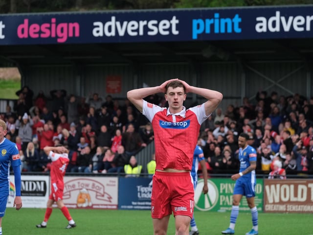 Boro winger Luca Colville holds his head in disbelief during the play-off final
