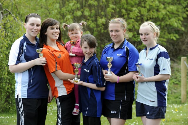Top girl players from the Scarborough Table Tennis Junior Closed Championship: Jess West, left, Grace Douthwaite (holding baby Ola Alvey, the coach's daughter), Natasha Wrightson, Alex and Katie Lee.