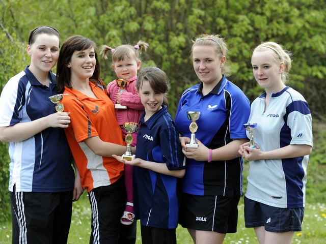 Top girl players from the Scarborough Table Tennis Junior Closed Championship: Jess West, left, Grace Douthwaite (holding baby Ola Alvey, the coach's daughter), Natasha Wrightson, Alex and Katie Lee.