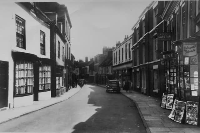 A vintage postcard can give many clues on when it was created despite the lack of a postmark. Postcard courtesy of Aled Jones