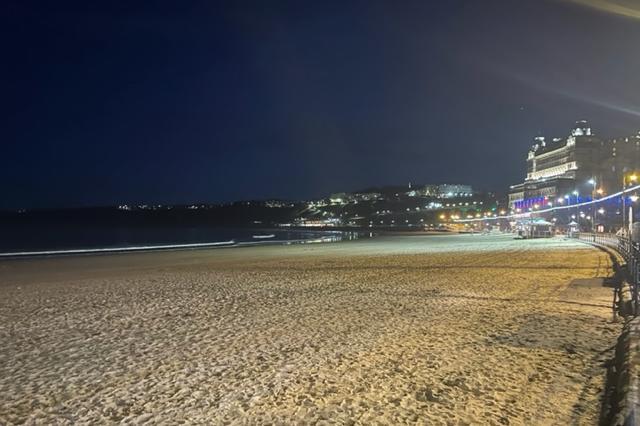 Colourful picture of Scarborough beach at night