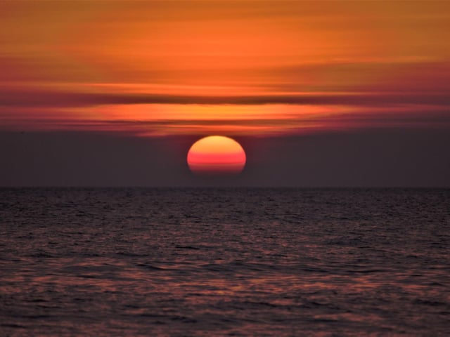 Stunning orange sunrise on Easter Sunday
