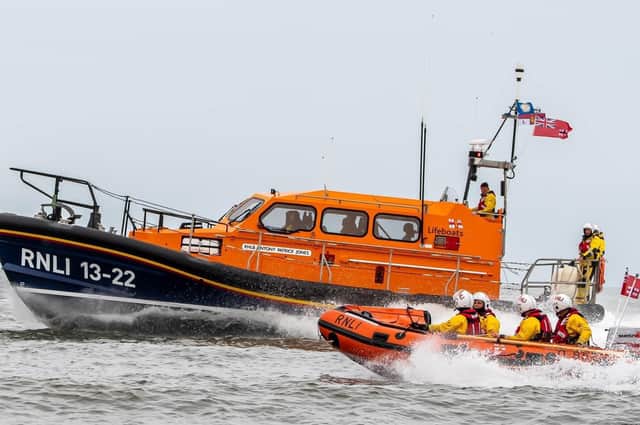 Mike Milner, Bridlington RNLI’s press officer, took this outstanding image of the two town lifeboats in action.
