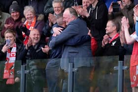 Scarborough Athletic chairman Trevor Bull and manager Jono Greening share a hug after the play-off final win

Photos by Richard Ponter