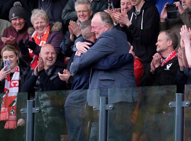 Scarborough Athletic chairman Trevor Bull and manager Jono Greening share a hug after the play-off final win

Photos by Richard Ponter