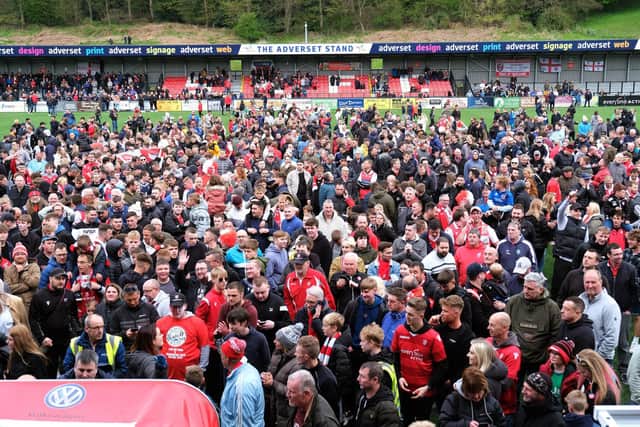 Boro fans swarm onto the Flamingo Land Stadium pitch for the post-match presentation after the play-off final win

Photo by Richard Ponter