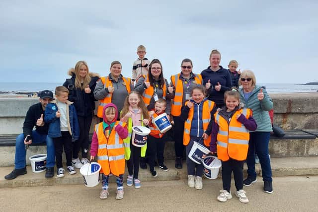 The fundraisers walked along Marine Drive on their way to the lifeboat station.