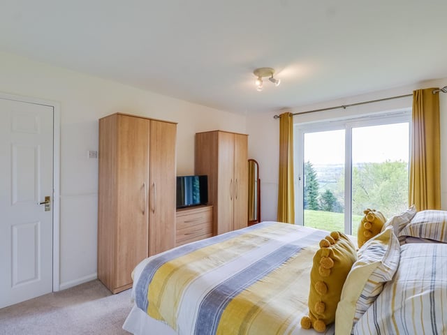 One of the double bedrooms within the property - with lovely views.