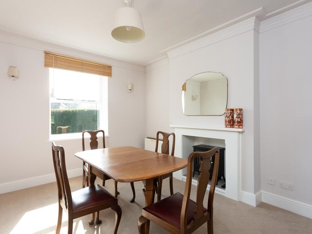 This dining room within the house could easily be used for another purpose within this versatile home.