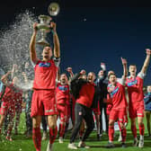 Will Thornton holds the North Riding FA Senior Cup aloft after Scarborough Athletic's 3-0 win in the final against Guisborough Town


Photo by Morgan Exley
