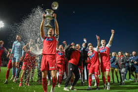Will Thornton holds the North Riding FA Senior Cup aloft after Scarborough Athletic's 3-0 win in the final against Guisborough Town


Photo by Morgan Exley