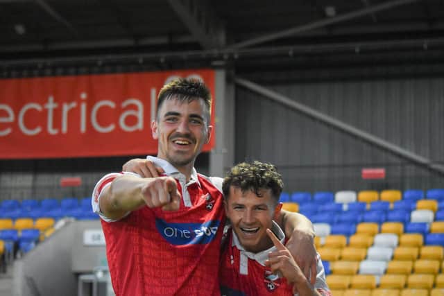 Skipper Will Thornton, left, celebrates with opening goalscorer Brad Plant after the latter's strike in Scarborough Athletic's 3-0 win in the final against Guisborough Town
Photo by Morgan Exley