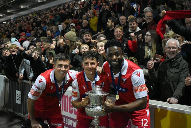 From left, players Lewis Maloney, Brad Plant and Kieran Weledji celebrate Boro winning the North Riding FA Senior Cup final

Photos by Morgan Exley