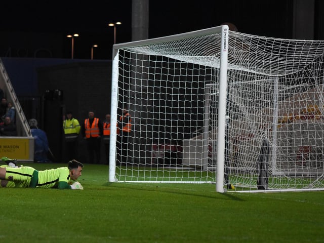 Ryan Watson's late shot beats the Town keeper to make it 3-0