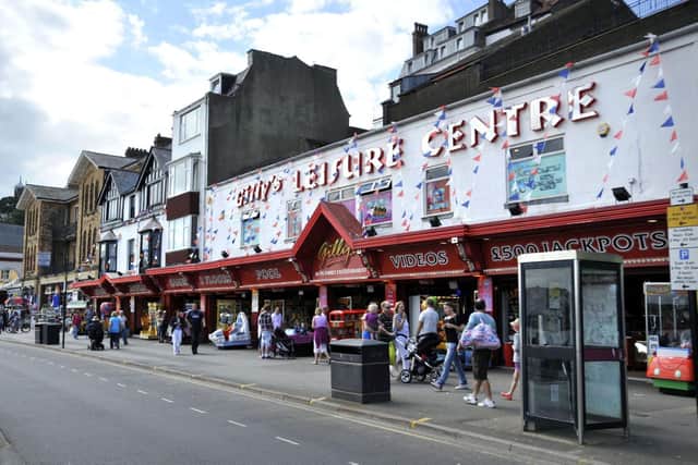 The teenage girl was assaulted outside Gilly's Amusements arcade, pictured.