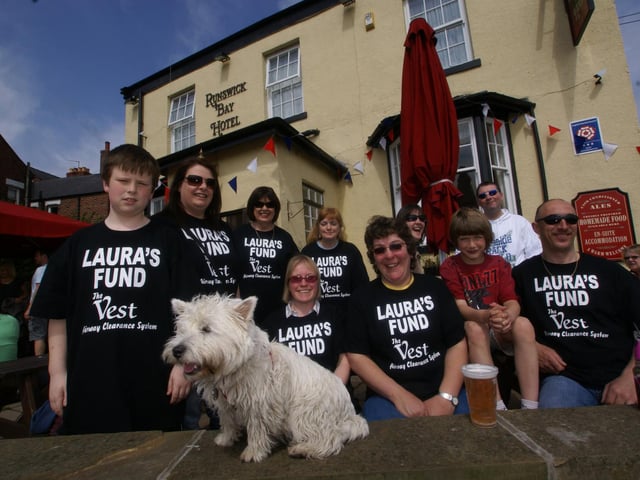 Gathering for the charity wellywanging at Runswick Bay Hotel in support of Laura's Fund.