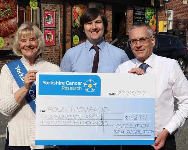 Jan Jagger, chair of the Bridlington Yorkshire Cancer Research group, is presented with a cheque for £4,237 for D&S Retail Stores.