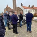 Martin Traves, Flamborough Lifeboat DLA, laid a wreath on behalf of the Flamborough Fishermen's Memorial Group and Councillor Vic Leppington a wreath on behalf of the
Flamborough Parish Council. Photo courtesy of Darren Traves