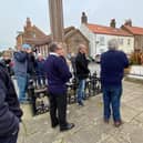 Martin Traves, Flamborough Lifeboat DLA, laid a wreath on behalf of the Flamborough Fishermen's Memorial Group and Councillor Vic Leppington a wreath on behalf of the
Flamborough Parish Council. Photo courtesy of Darren Traves